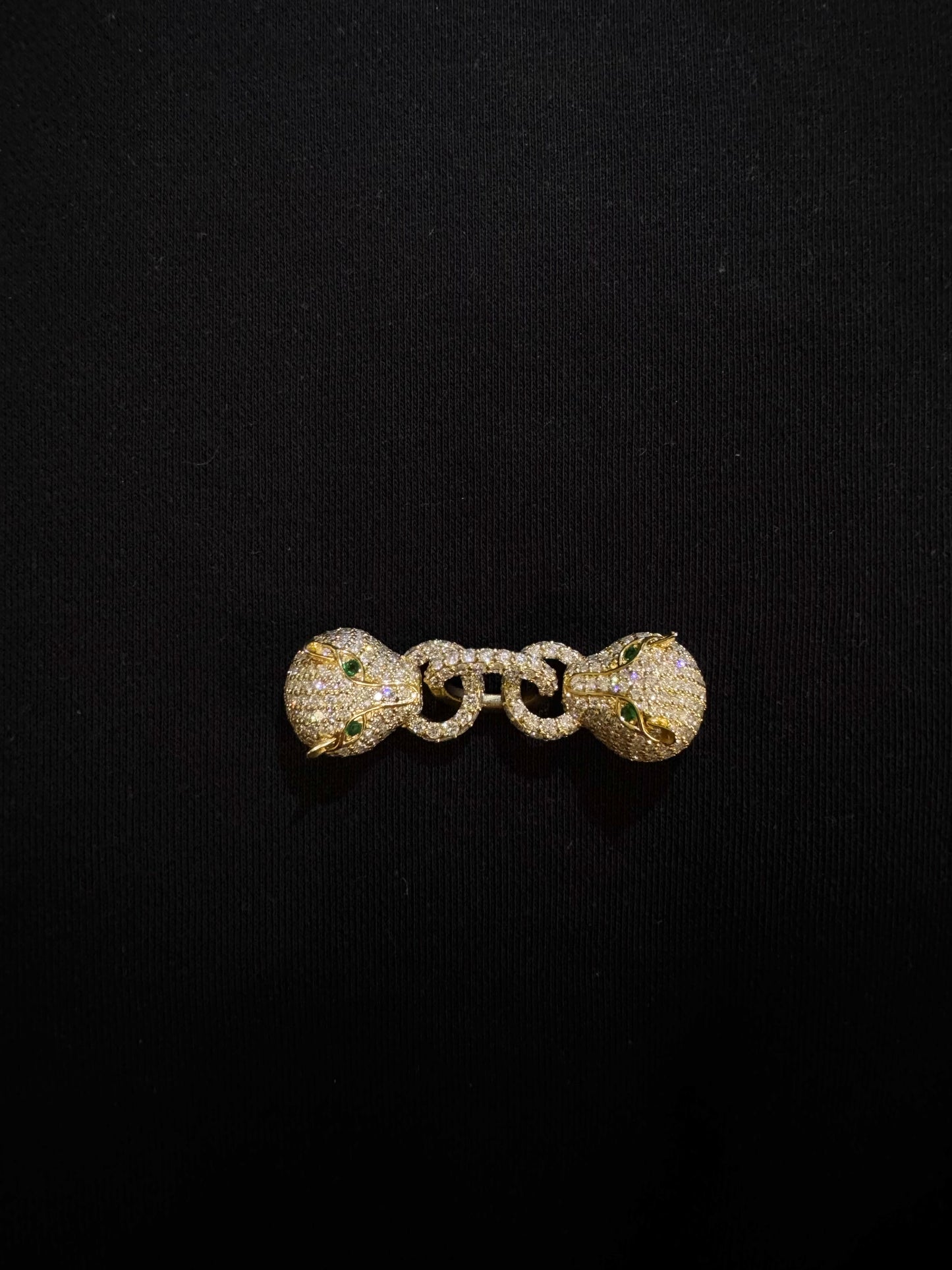 Two panther diamond studded