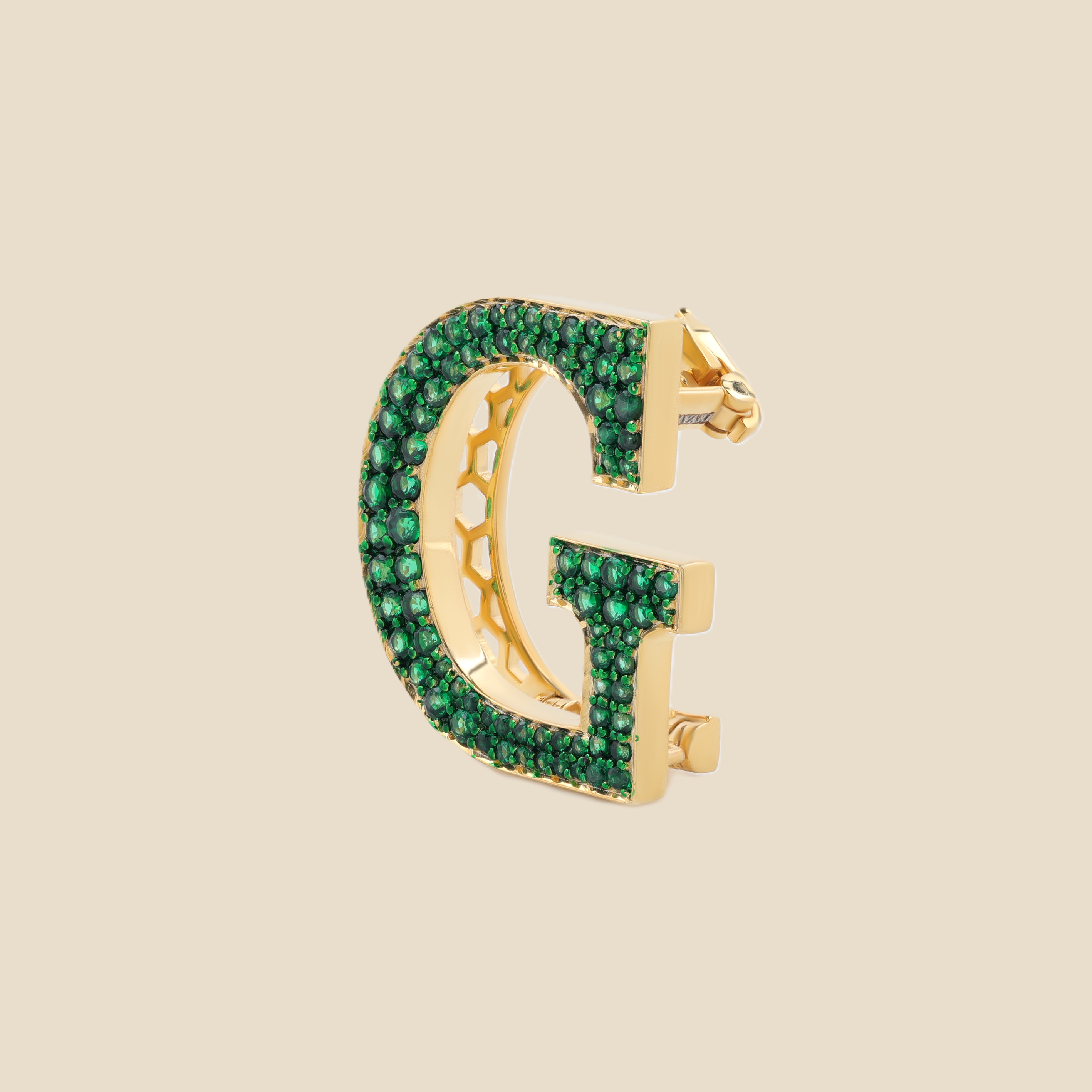 Letter G in Emeralds Tavari