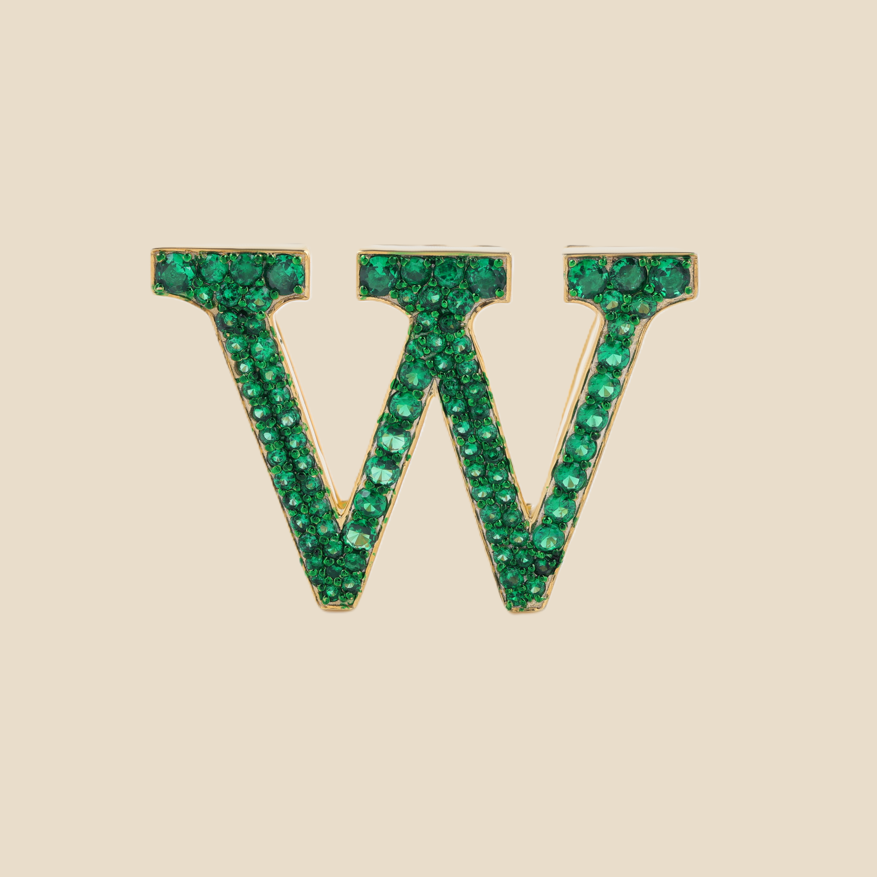 Letter W in Emeralds Tavari