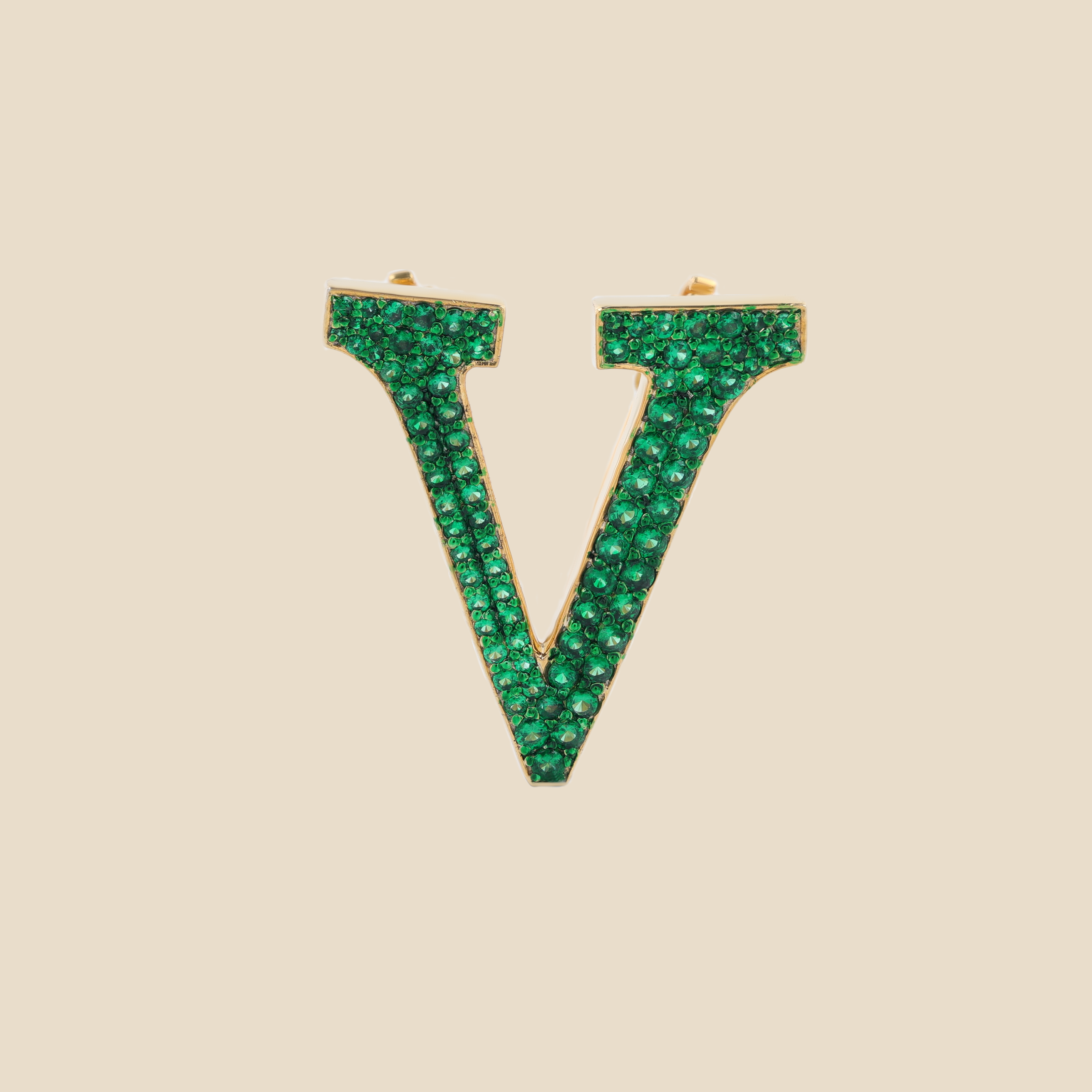 Letter V in Emeralds Tavari