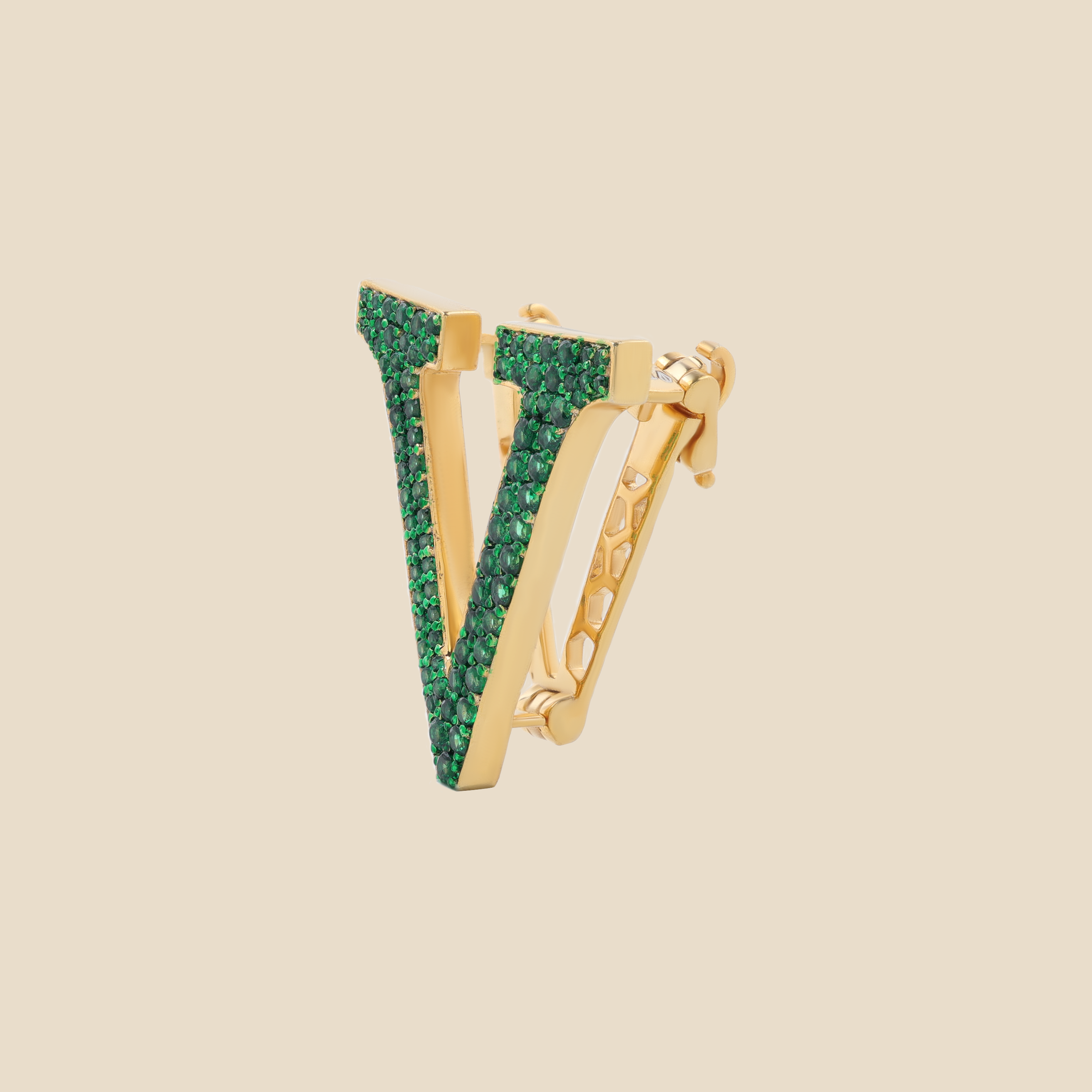 Letter V in Emeralds Tavari