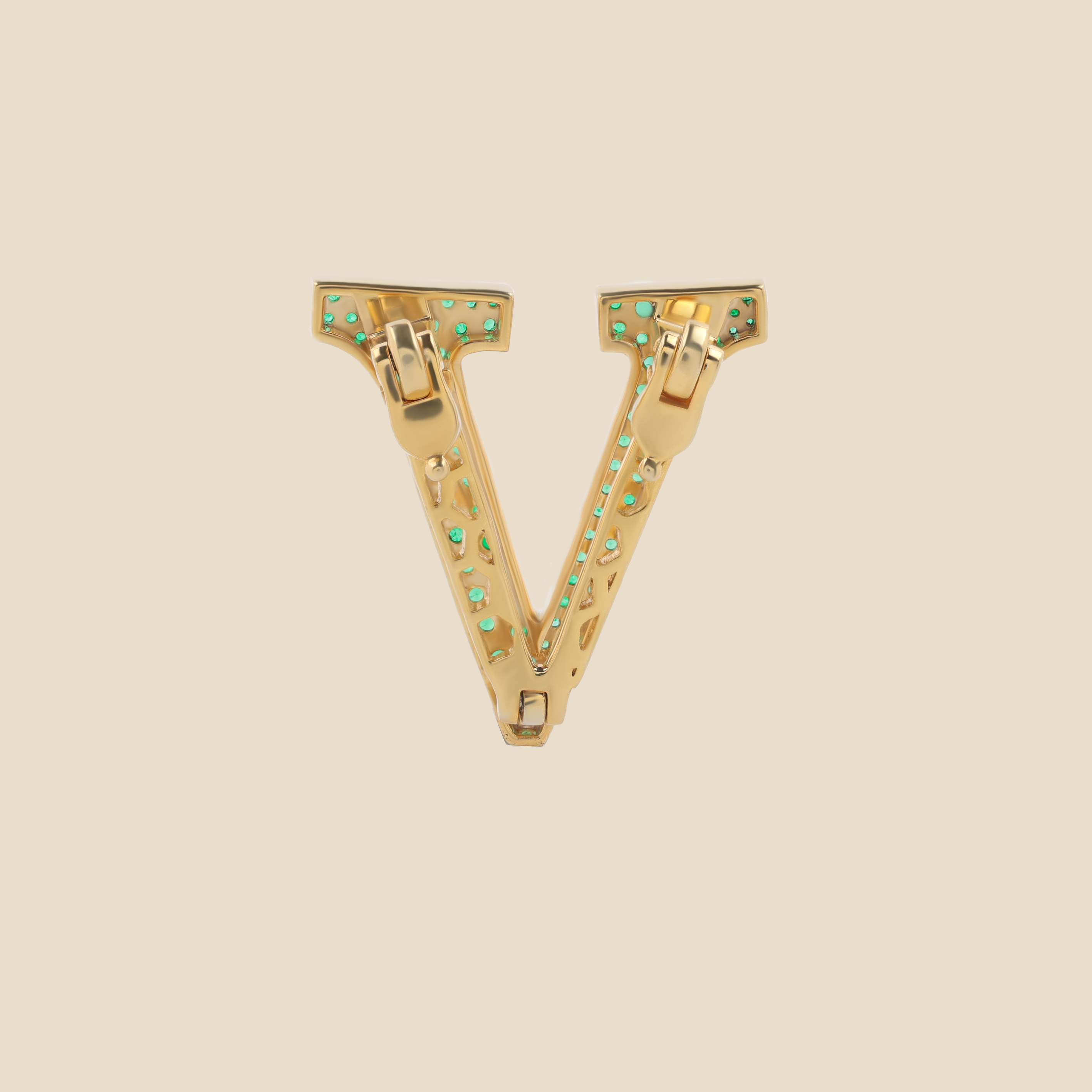 Letter V in Emeralds Tavari