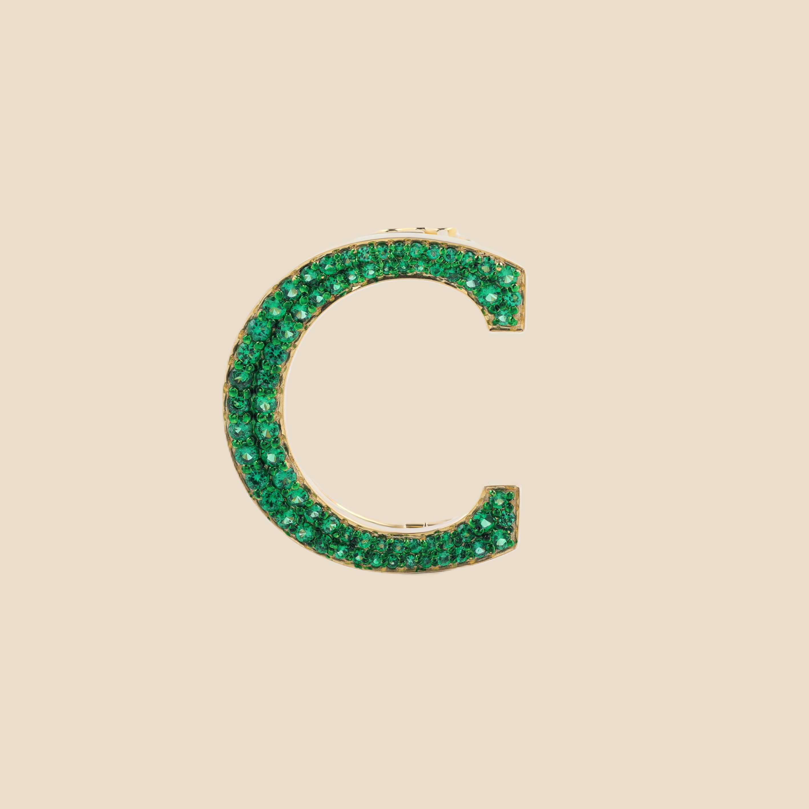 Letter C in Emerald Tavari