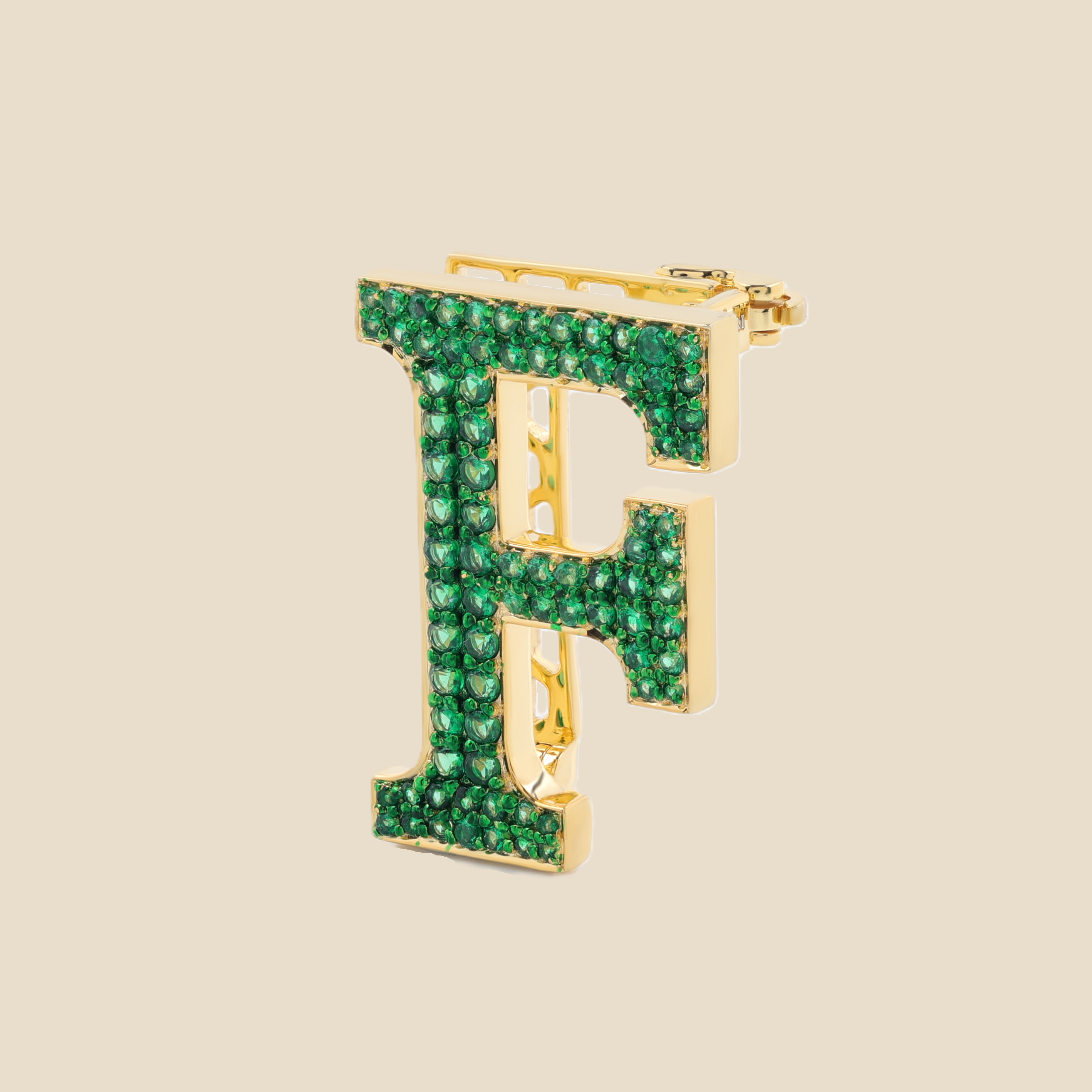 Letter F in Emeralds Tavari