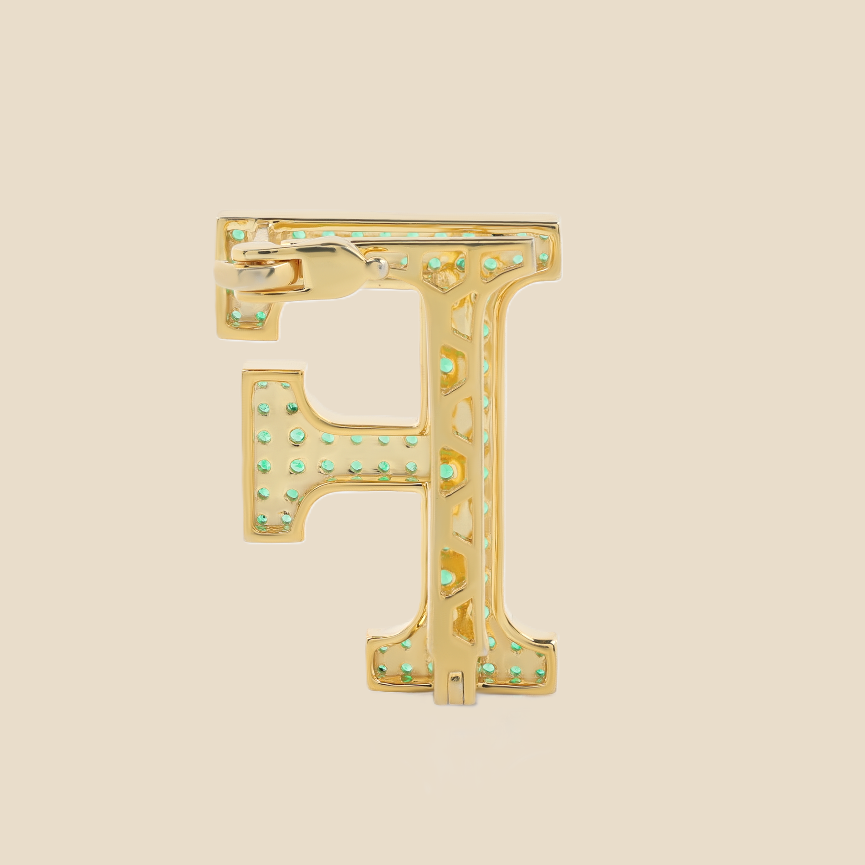 Letter F in Emeralds Tavari