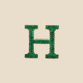 Letter H in Emeralds Tavari