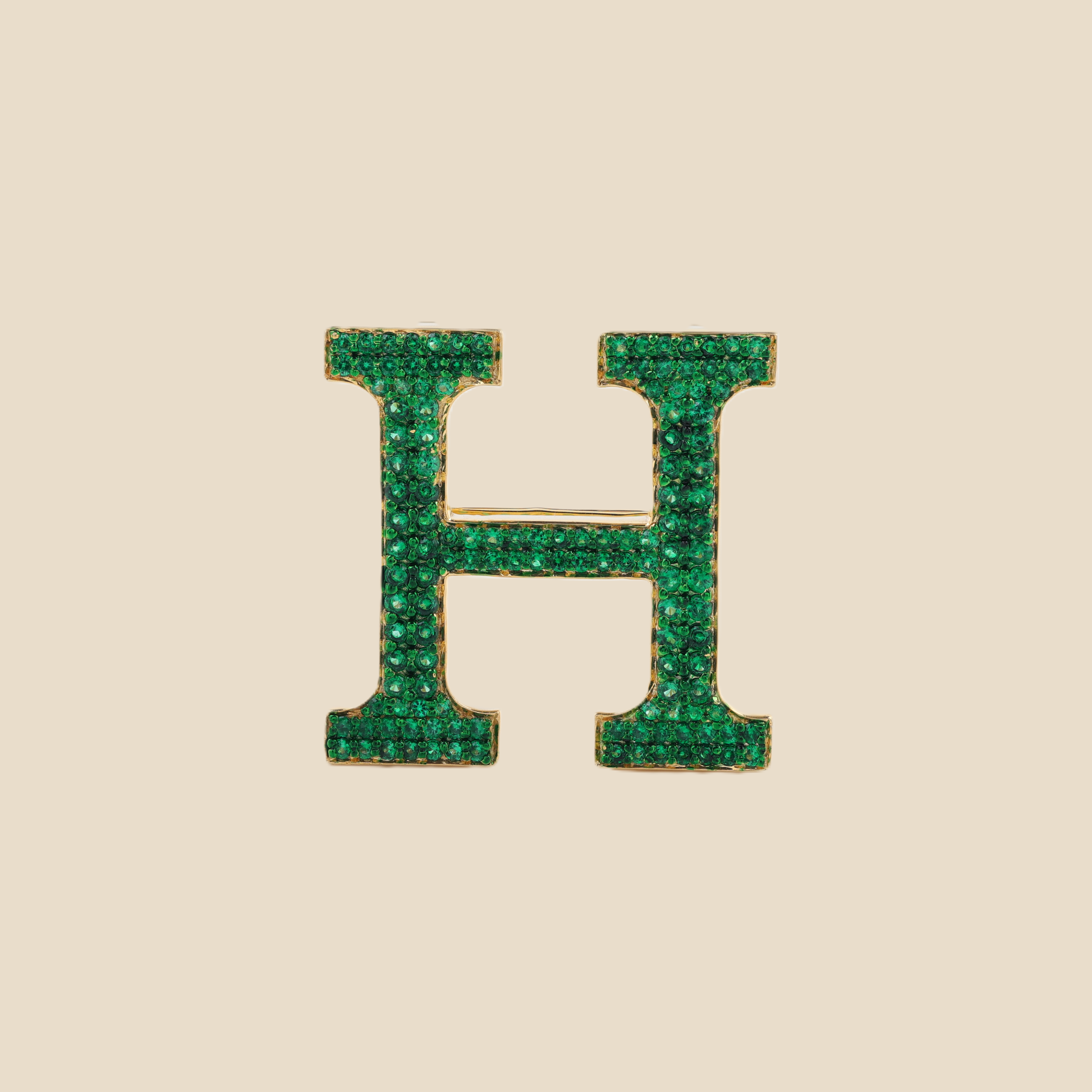 Letter H in Emeralds Tavari