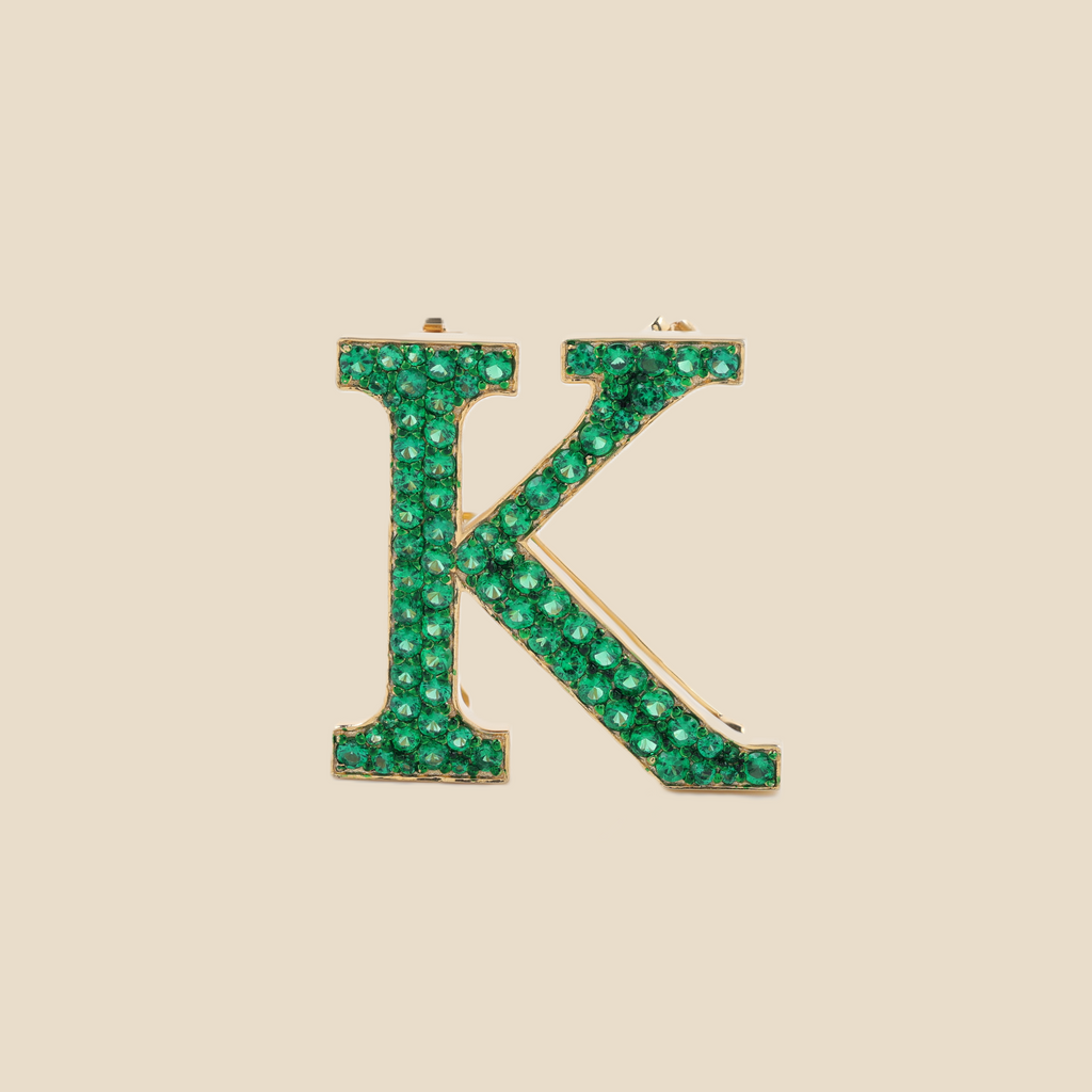 Letter K in Emeralds Tavari