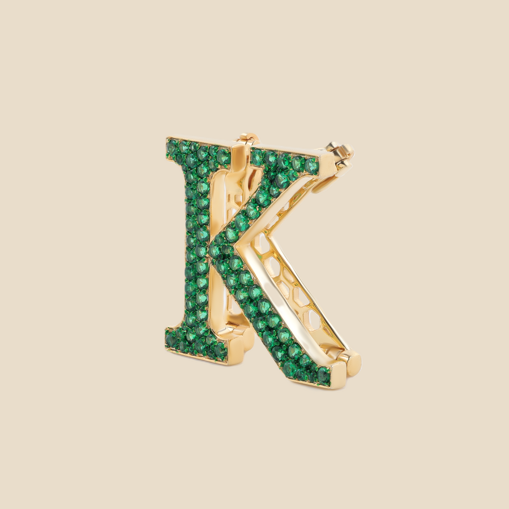Letter K in Emeralds Tavari