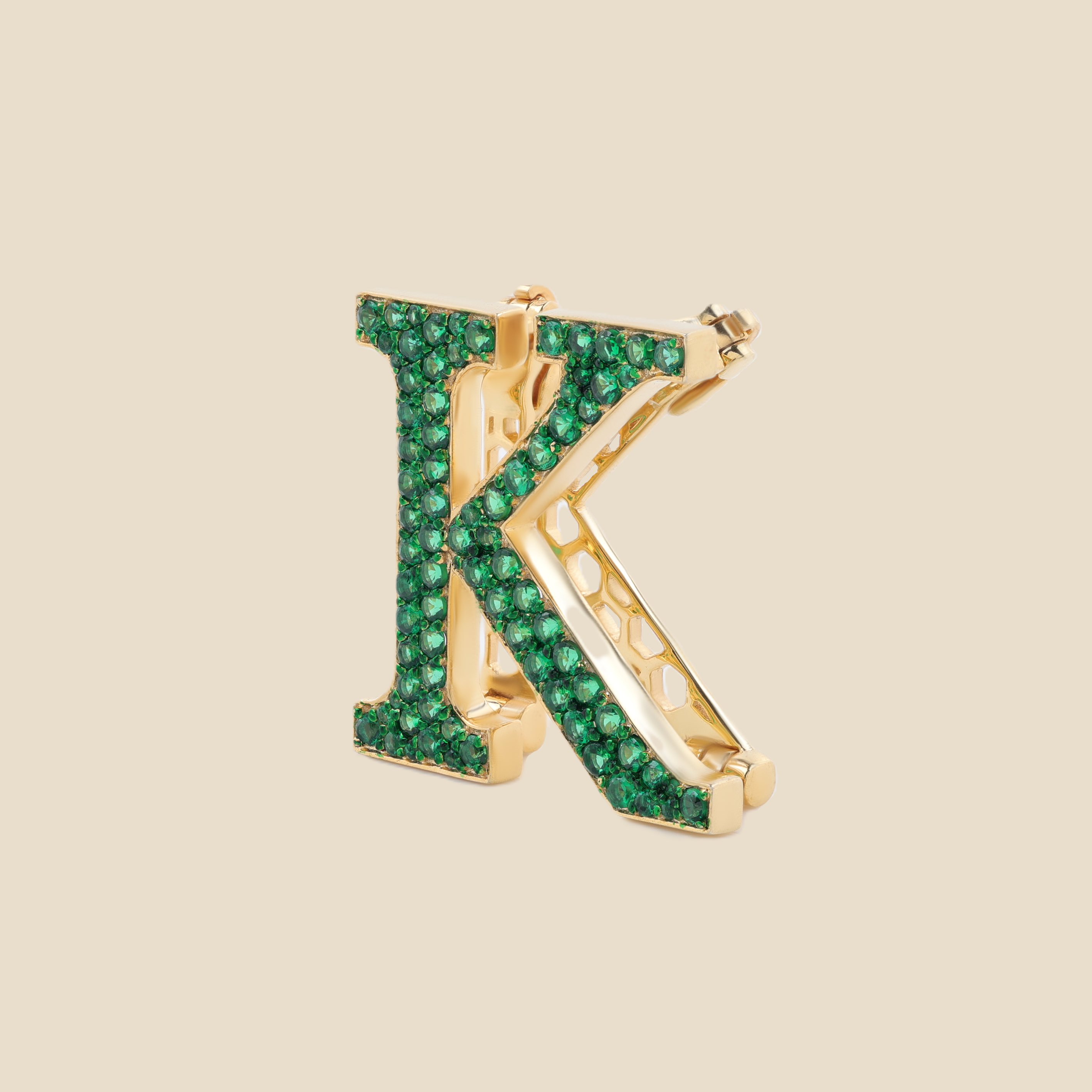 Letter K in Emeralds Tavari