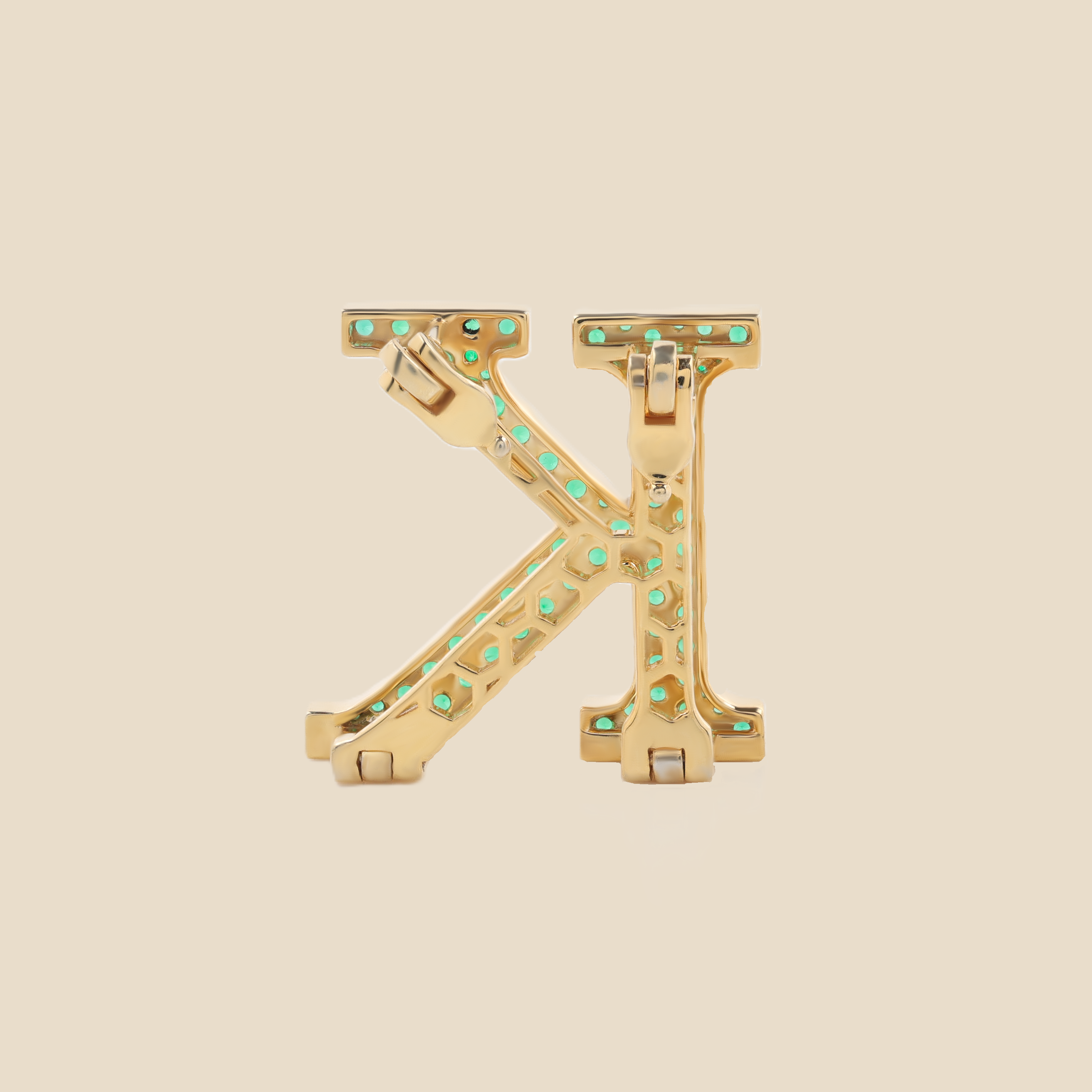 Letter K in Emeralds Tavari