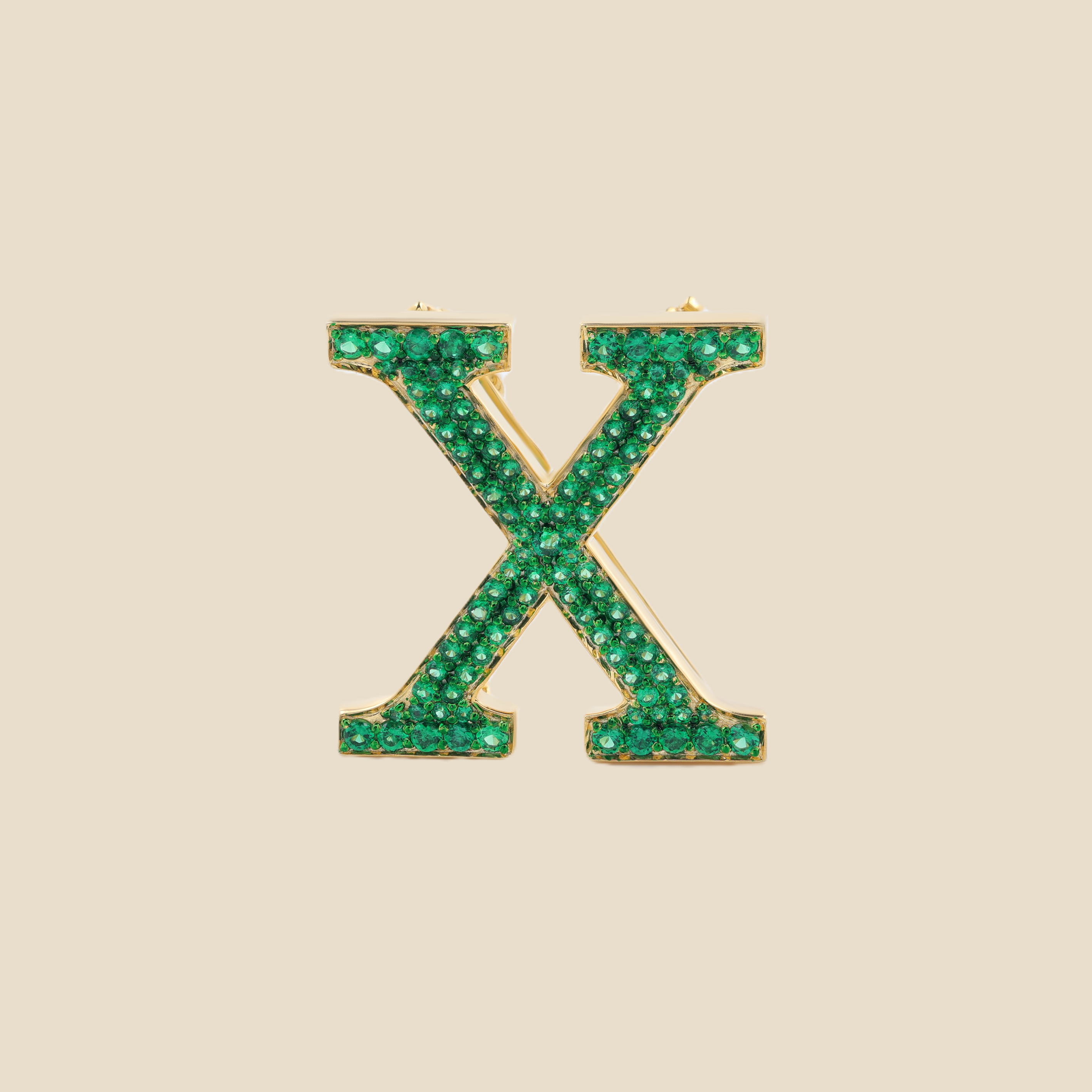 Letter X in Emeralds Tavari