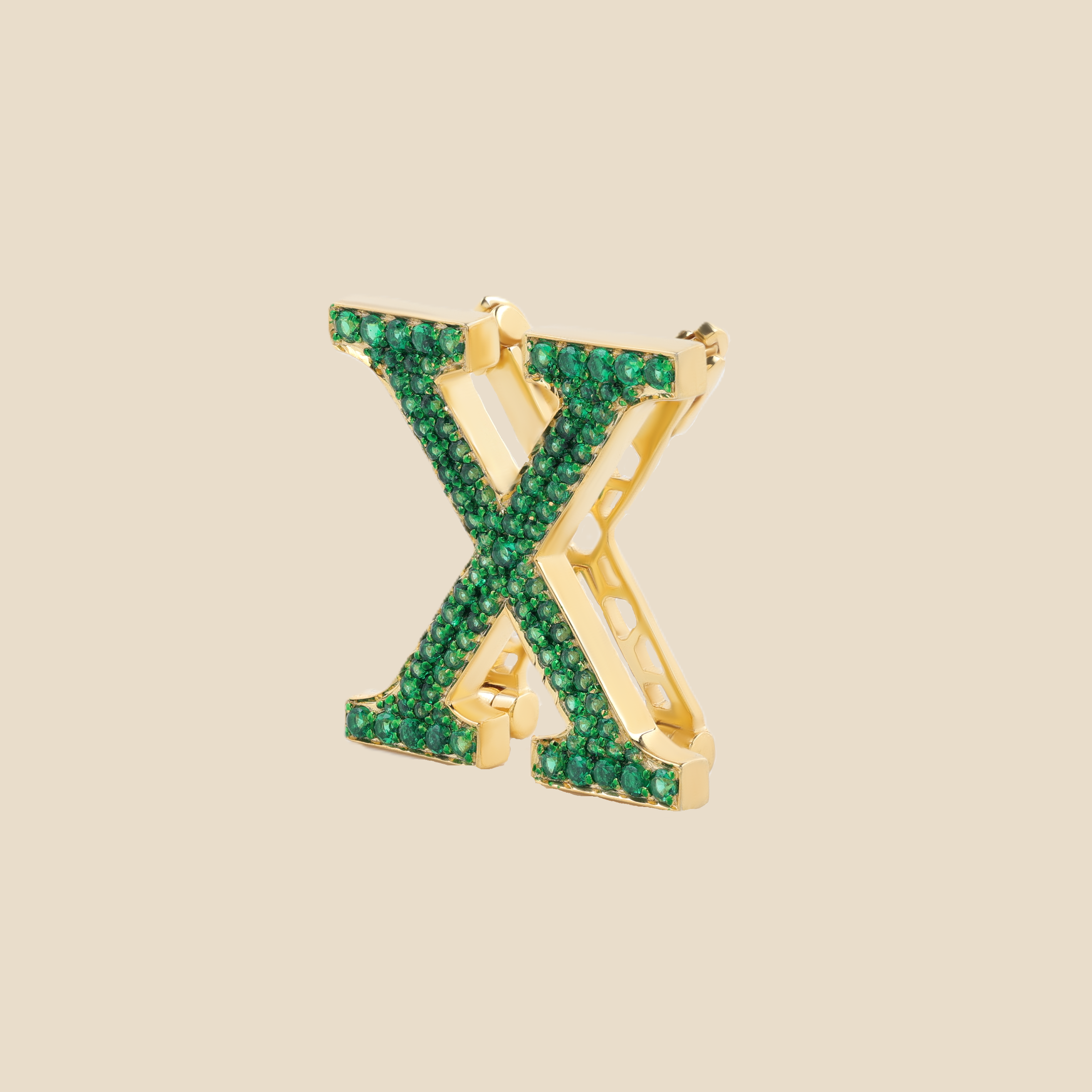 Letter X in Emeralds Tavari