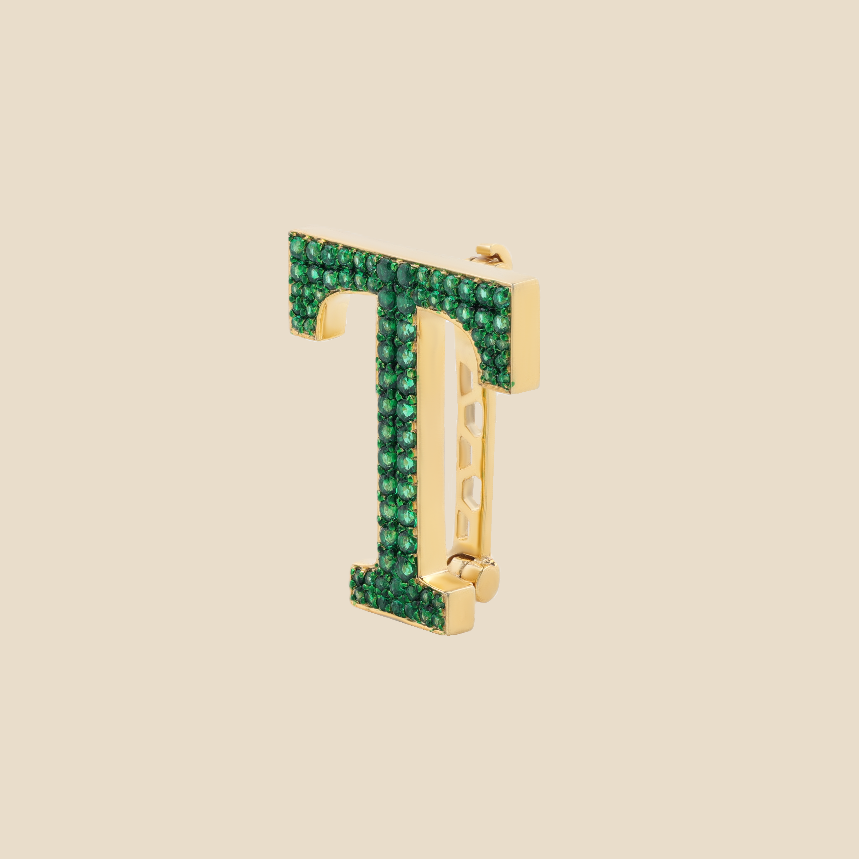 Letter T in Emeralds Tavari