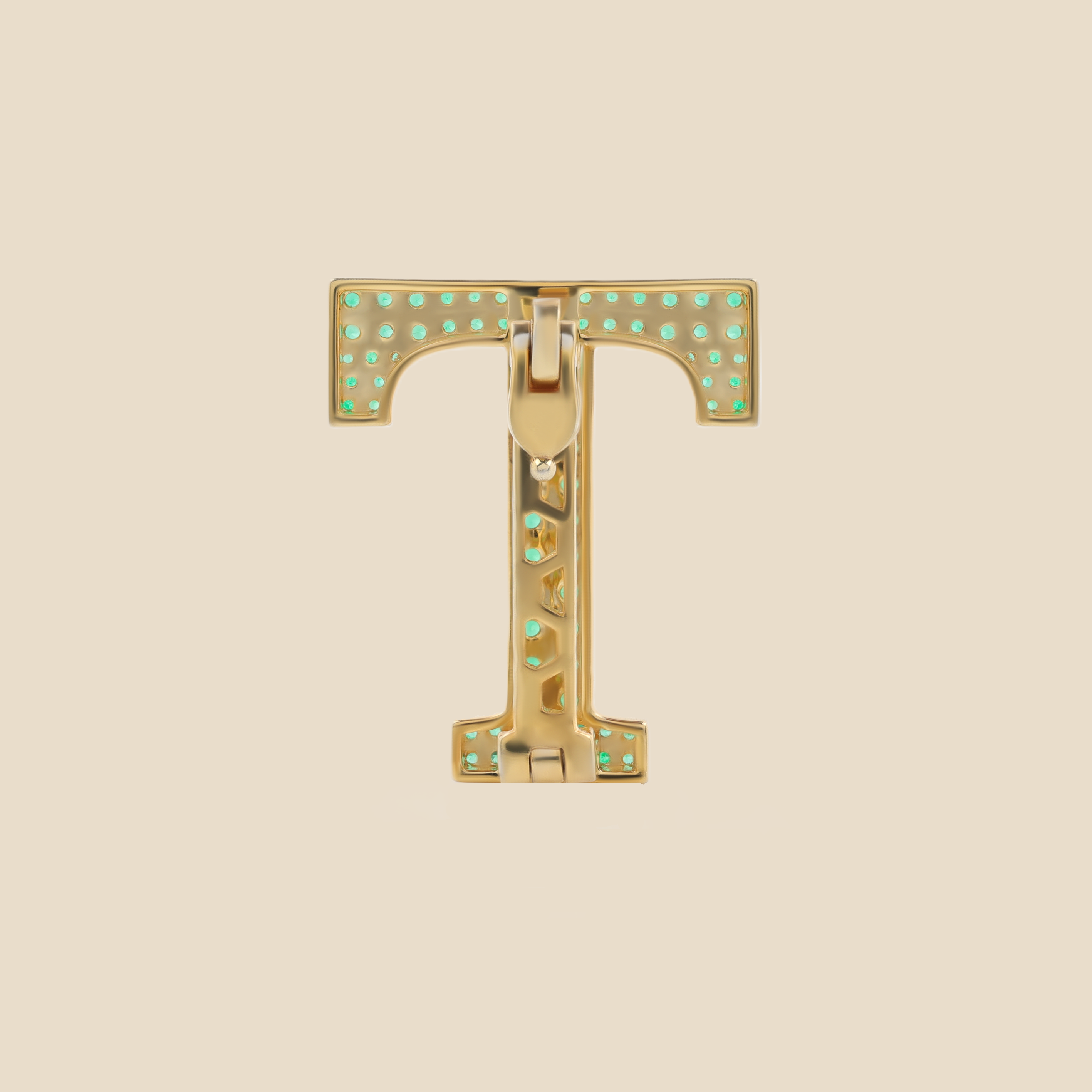 Letter T in Emeralds Tavari