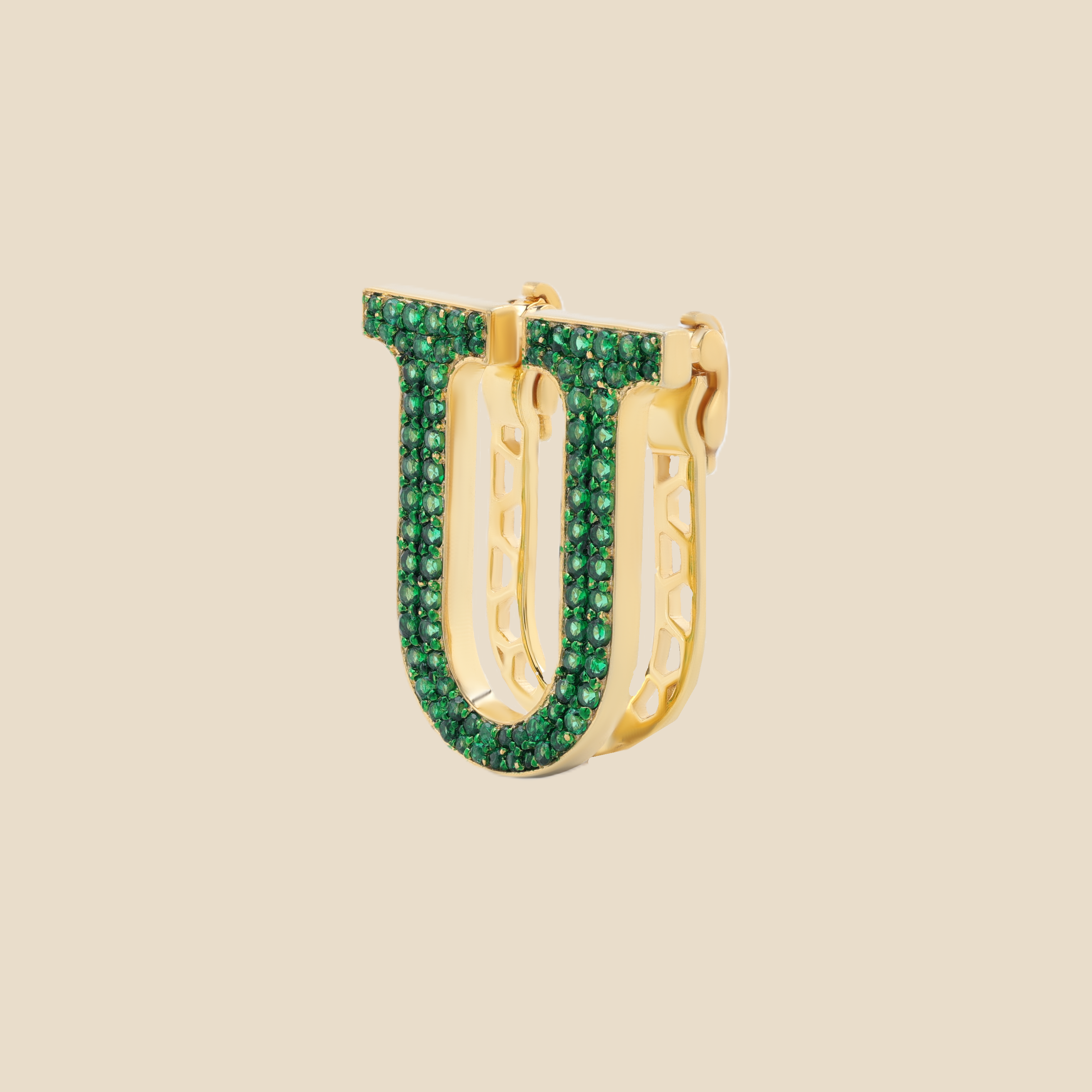 Letter U in Emeralds Tavari