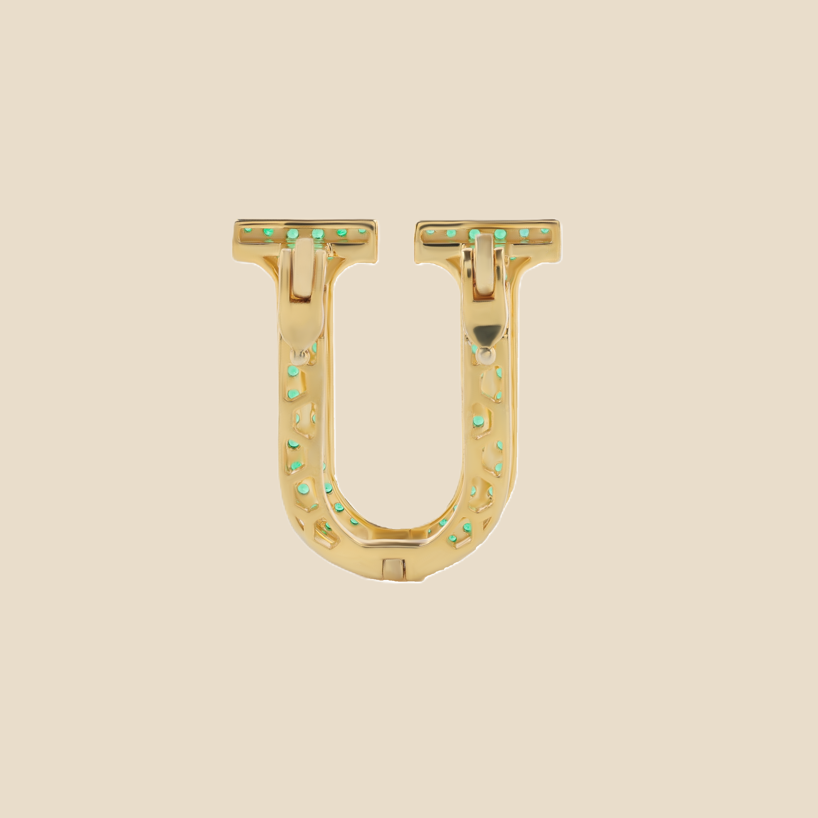 Letter U in Emeralds Tavari