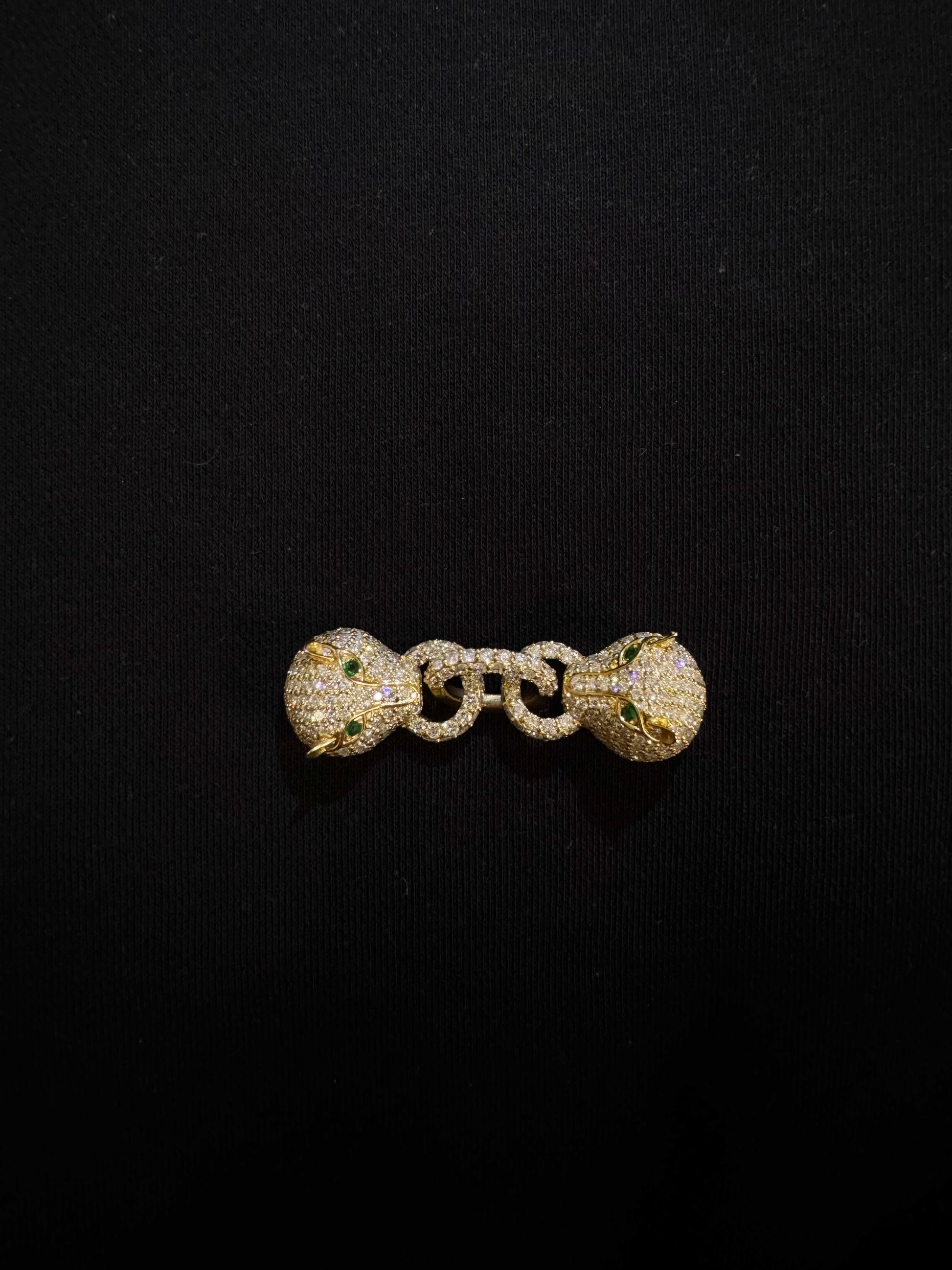 Two panther diamond studded