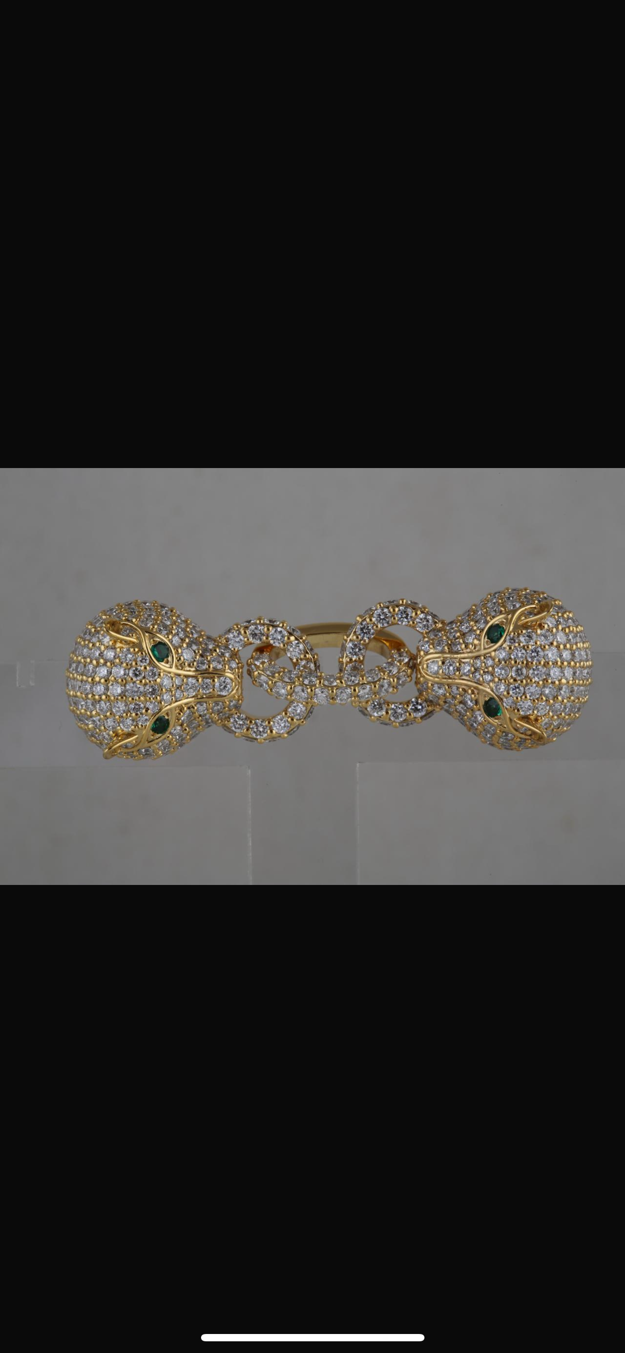 Two panther diamond studded