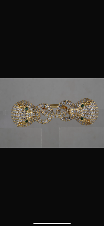 Two panther diamond studded